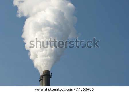 smoke pipe of a heat and power plant against blue sky,  Schornstein eines Wärme und Heizkraftwerkes vor blauem Himmel
