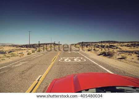 view from red car on famous Route 66 in Californian desert, USA, Vintage filtered style