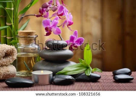 stock photo : zen basalt stones and bamboo on the wood