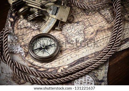 vintage  still life with compass,sextant and old map