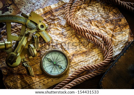 vintage  still life with compass,sextant and old map.