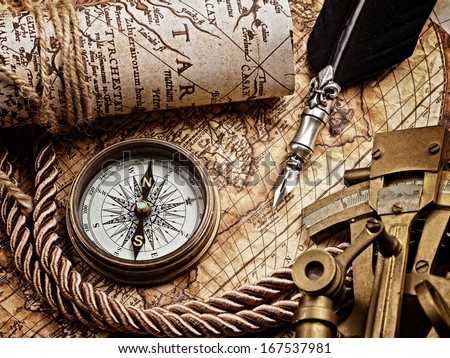 vintage still life with compass,sextant and old map.map