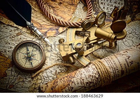 vintage still life with compass,sextant and old map.map used for background is in Public domain. Map source: Library of Congress. Country: Belgium Year: 1570. Author: Abraham Ortelius (1527-1598)