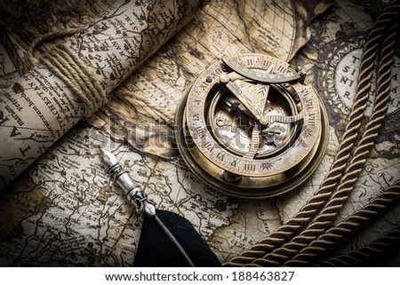 vintage still life with compass,sextant and old map