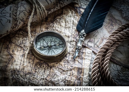 vintage  still life with compass on the old map.