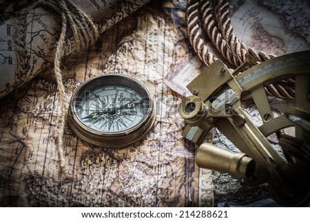 vintage  still life with compass on the old map