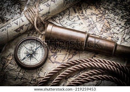 vintage  still life with compass ,sextant ,spyglass ,and old map