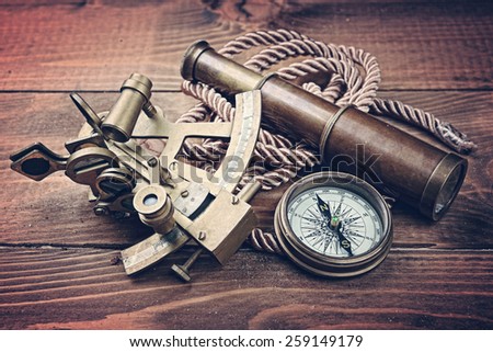 vintage  still life with compass,sextant and spyglass .Vintage tone
