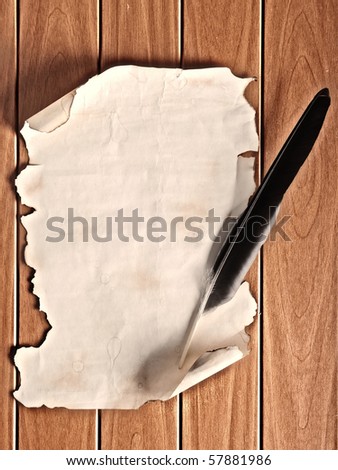 Old scroll paper with quill pen