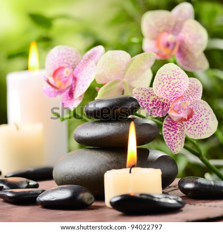 stock photo : zen basalt stones and bamboo on the wood