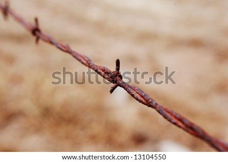 barbed wire fence close up