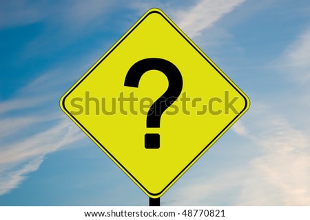 A yellow and black road sign with a question mark