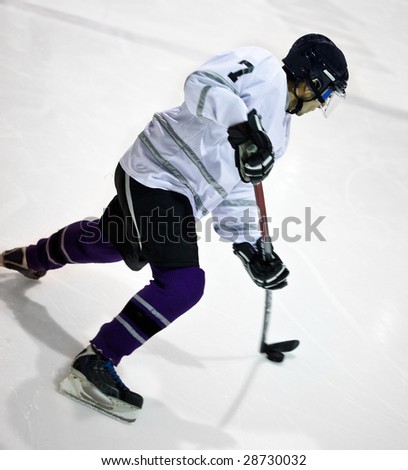 Hockey player taking a shot