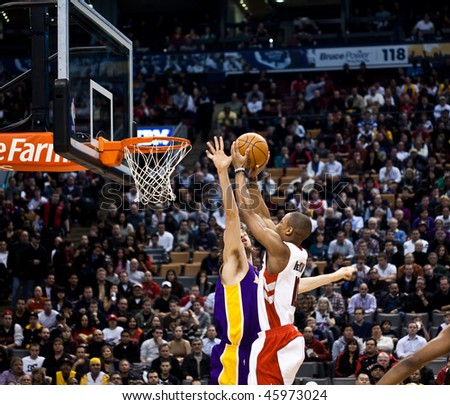 TORONTO - JANUARY 24: DeRozan (R) participates in an NBA basketball game at the Air Canada Centre on January 24, 2010 in Toronto, Canada.  The Toronto Raptors beat the Los Angeles Lakers 106-105.