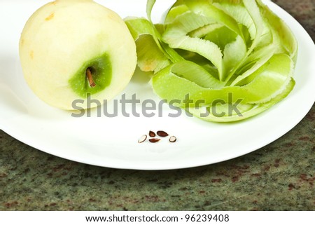 Peeling Granny Smith apples for cooking