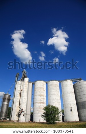 Grain silos with a blue sky and copy space.