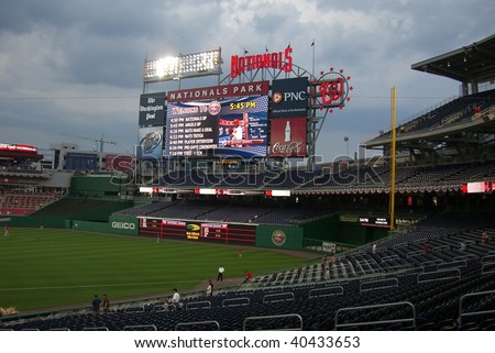 WASHINGTON, DC - JUNE 23: The Washington Nationals take batting practice under the scoreboard in brand new Nationals Park June 23, 2008 in Washington, DC.