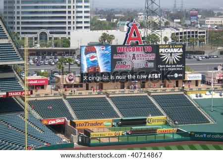 ANAHEIM - APRIL 26: Early arriving fans stroll under the giant scoreboard as they await a spring contest at Angels Stadium of Anaheim on April 26, 2007 in Anaheim, California.
