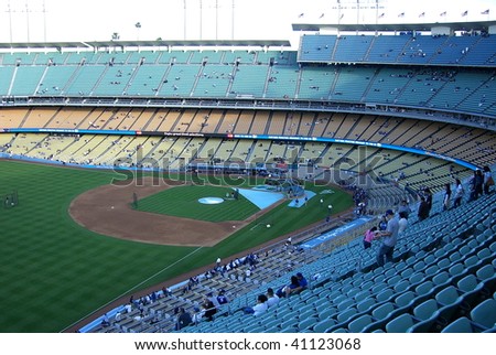 LOS ANGELES - APRIL 25: Dodger fans file in for a spring baseball game at Dodger Stadium on April 25, 2007 in Los Angeles, California.