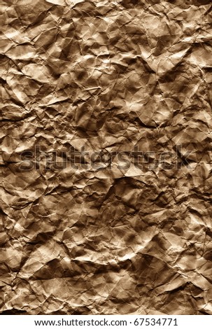 Grunge folded paper texture in brown tones