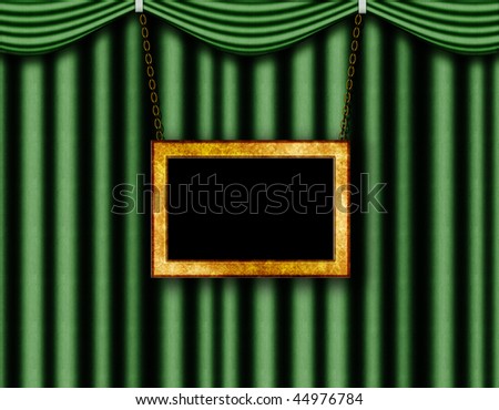 Picture frame hanging on a chain, on the background of green curtains