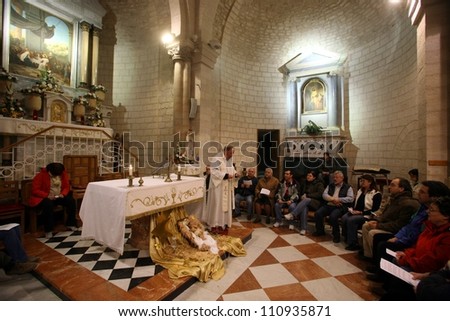 CANA , ISRAEL - DECEMBER 30: The Church of Jesus\' first miracle. Couples from all over the world come to renew their wedding vows, Cana, Israel on December 30, 2007.