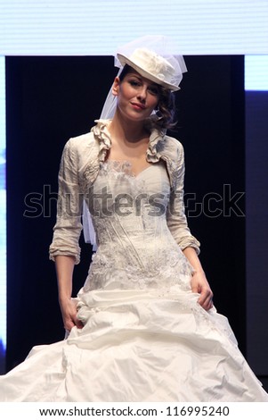 ZAGREB, CROATIA - OCTOBER 27: Fashion model wears wedding dress made by In Atelier Hera on \'Wedding days\' show, October 27, 2012 in Zagreb, Croatia.
