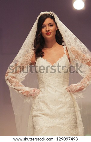 ZAGREB, CROATIA - FEBRUARY 16: Fashion model wears wedding dress made by Vesna Sposa on \'Wedding days\' show, February 16, 2013 in Zagreb, Croatia.