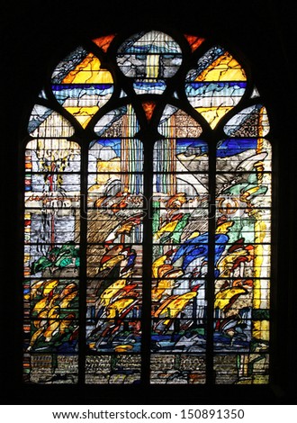 PARIS, FRANCE - NOV 07, 2012: Abstract stained glass, church is dedicated Gervasius and Protasius is one of the oldest in Paris. Known for its richly painted stained glass, Paris on Nov 07, 2012