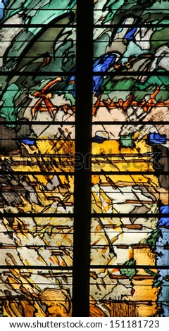 PARIS, FRANCE - NOV 07, 2012: Abstract stained glass, church is dedicated Gervasius and Protasius is one of the oldest in Paris. Known for its richly painted stained glass, Paris on Nov 07, 2012