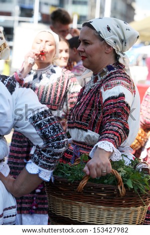 ZAGREB,CROATIA - JULY 17: Members of folk groups from Bistra in Croatia national costume during the 47th International Folklore Festival in center of Zagreb,Croatia on July 17,2013