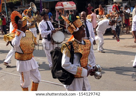 KOLKATA,INDIA - NOV 28: Annual Jain Digamber Procession in Kolkata,India on Nov 28,2012. The city absorbing a population of over 15 million Bengalis, come alive during the festive season.