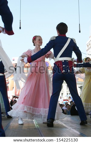 ZAGREB,CROATIA - JULY 18: Members of the ensemble song and dance Warsaw School of Economics in in old style costumes during the 47th International Folklore Festival in Zagreb,Croatia on July 18,2013