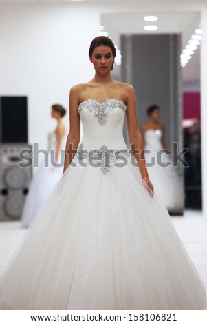 ZAGREB, CROATIA - OCTOBER 12: Fashion model in wedding dress made by Hera \'Wedding Expo\' show in the Westgate Shopping City in Zagreb, Croatia on October 12, 2013