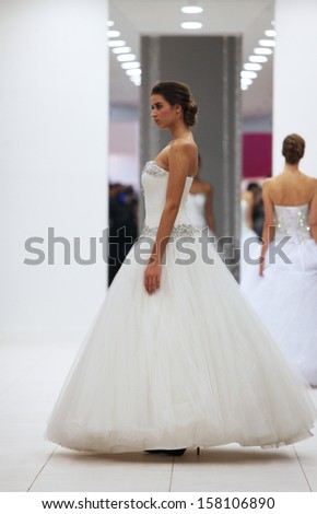 ZAGREB, CROATIA - OCTOBER 12: Fashion model in wedding dress made by Hera \'Wedding Expo\' show in the Westgate Shopping City in Zagreb, Croatia on October 12, 2013