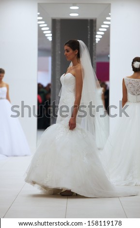 ZAGREB, CROATIA - OCTOBER 12: Fashion model in wedding dress made by Lisa and Maggie Sottero on 'Wedding Expo' show in the Westgate Shopping City in Zagreb, Croatia on October 12, 2013