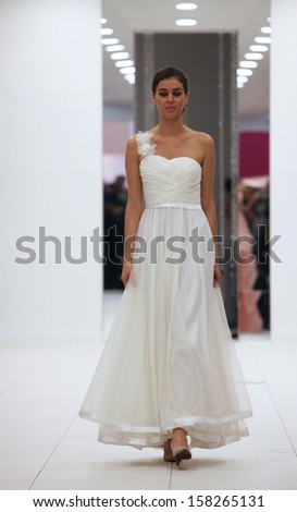 ZAGREB, CROATIA - OCTOBER 12: Fashion model in wedding dress made by Silhuete Bride on \'Wedding Expo\' show in the Westgate Shopping City in Zagreb, Croatia on October 12, 2013
