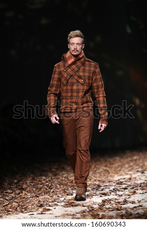 ZAGREB, CROATIA - OCTOBER 26: Fashion model wearing clothes designed by Boris Pavlin on the Cro a Porter show on October 26, 2013 in Zagreb, Croatia.