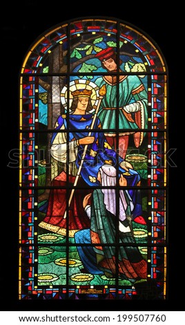 PARIS,FRANCE NOV 07:Saint Louis IX of France, Notre-Dame de Clignancourt church located in the 18th arrondissement of Paris. Completed in 1863. Windows are from the Art Deco period. On Nov 07 in Paris
