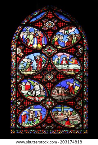 PARIS, FRANCE - NOV 11, 2012: Scenes from the life of the Christ, stained glass from Church of St-Germain-l\'Auxerrois founded in the 7th century, was rebuilt many times over several centuries.