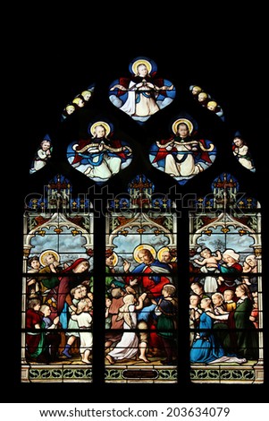 PARIS, FRANCE - NOV 11, 2012: Jesus Friend of Little Children, stained glass.The Church of St Severin is Catholic church in the Latin Quarter. It is one of the oldest churches on the Left Bank.