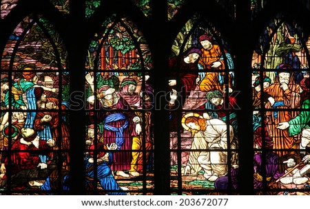 PARIS, FRANCE - NOV 09,2012:Christ and the adulteress, stained glass.Church of Saint-Jean-de-Montmartre situated at the foot of Montmartre. Built from 1894 through 1904., Nov 09, 2012 in Paris,France.