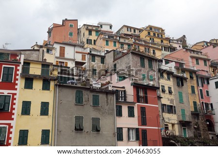 LIGURIA, ITALY - MAY 02, 2014: Riomaggiore, one of the Cinque Terre villages, UNESCO World Heritage Sites, remains a magnet for tourists to the famous Via dell'Amore remains closed, Riomaggiore, Italy