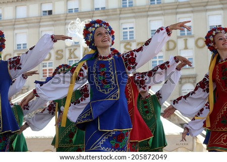ZAGREB, CROATIA - JULY 17: Members of folk group Edmonton (Alberta), Ukrainian dancers Viter from Canada during the 48th International Folklore Festival in center of Zagreb,Croatia on July 17, 2014
