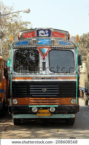 KOLKATA, INDIA - FEBRUARY 09:Truck waits for a new cargo nearby Kolkata Flower Market on February 09, 2014. Using trucks is the most common way of transporting cargo in India.