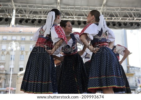 ZAGREB, CROATIA - JULY 17: Members of folk group Detva from Slovakia during the 48th International Folklore Festival in center of Zagreb,Croatia on July 17, 2014