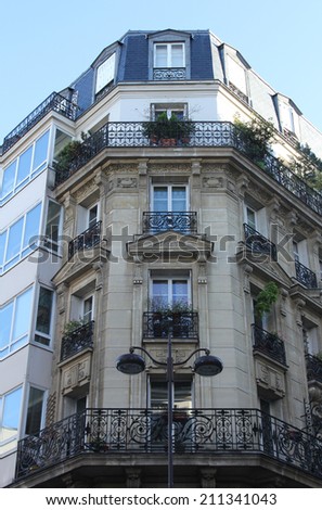 PARIS, FRANCE - NOVEMBER 04, 2012: Facade of a traditional apartment building in Paris, France on November 04, 2012