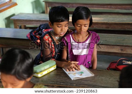 KUMROKHALI, INDIA - FEBRUARY 13, 2014: Kids learn at school. School name is the name of a famous Croatian missionary, Father Ante Gabric