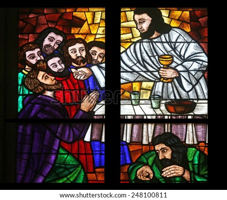 VIENNA, AUSTRIA - OCTOBER 10: Last supper, Stained glass in Votiv Kirche (The Votive Church). It is a neo-Gothic church in Vienna, Austria on October 10, 2014