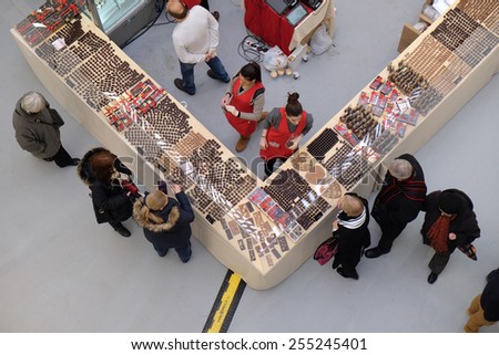 ZAGREB, CROATIA, FEBRUARY 13, 2015: People take a tour and buy chocolate products at the Fair chocolate in Zagreb. on February 13, 2015.